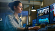 © Gorodenkoff - Female Video Editor Works with Footage and Sound on Her Personal Computer. She Works Late. Her Office is Modern and Creative Loft Studio.