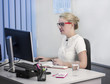 © volhavasilevich - Young beautiful blonde girl is working in the office close-up