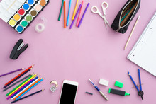 Colourful School Supplies With A Smartphone With Copyspace In The Center