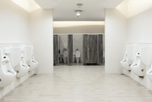 Men's Room Urinals Discharge ,Toilet Bowl In A Modern Bathroom With Bins And Toilet Paper,flush Toilet Clean Bathroom