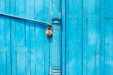 Padlock On A Blue Door