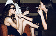 © Marko Milanovic/Stocksy - Girls,cigarettes and champagne.