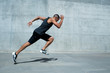 © ZOA PHOTO/Stocksy - Young man fitness training outdoors