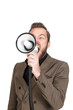 © _robbie_ - Furious screaming businessman with a megaphone speaker wearing a brown suit and shirt. White background.