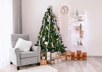 Wall Mural - Decorated room with beautiful Christmas tree and gifts