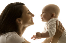 Mother And Baby, Mom Looking To Newborn Child Face To Face, Happy Kid Six Months Old