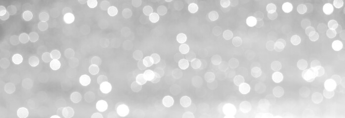 silver and white bokeh lights defocused. abstract background