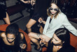 © Marko Milanovic/Stocksy - Stylish females in club