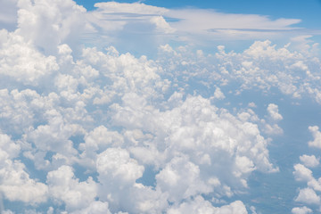 Wall Mural - blue sky and beautiful clouds.view from window of an airplane.
