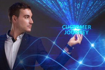 Business, Technology, Internet and network concept. Young businessman working on a virtual screen of the future and sees the inscription: Customer journey