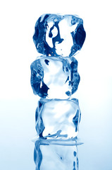 Wall Mural - Three ice cubes tower on white background