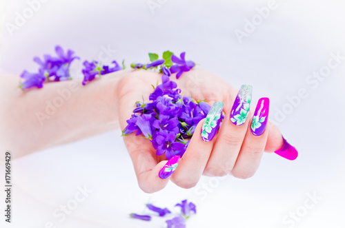 Fotografija Nails decorated with floral arrangements for a colorful spring and a beautiful s