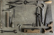 © Mellimage/Stocksy - Variety of old tools seen from above