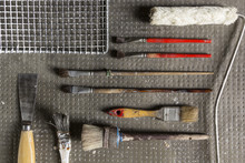 Variety Of Painting Tools On A Stone Background
