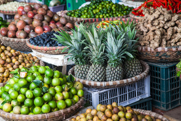 tropical spices and fruits sold at a local market in Hanoi (Vietnam)