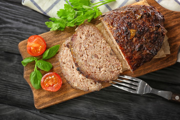 Sticker - Tasty baked turkey meatloaf on wooden board