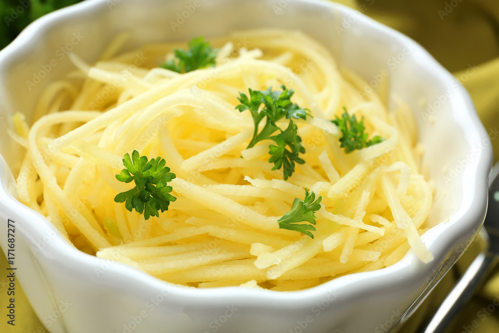 Bowl with flesh of spaghetti squash, close up