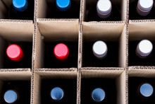 Wine Bottles Of Red And White Wine In Cardboard Case View From Top