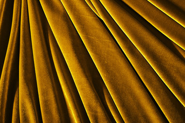 golden color velvet textile photo for background or texture