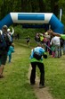 © nannycz - a man photographing children cross country running race