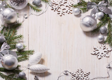 Silver Christmas Decoration On Wooden Background