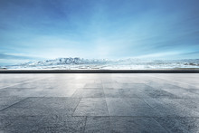 Empty Floor With Beautiful Snow Mountains In Blue Sky