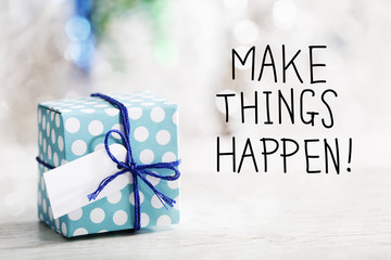 Wall Mural - Make Things Happen message with small handmade gift box 