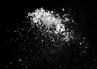 Wall Mural - white powder explosion isolated on black background for graphic resources