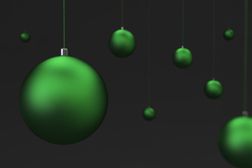 Set of green christmas balls on black background