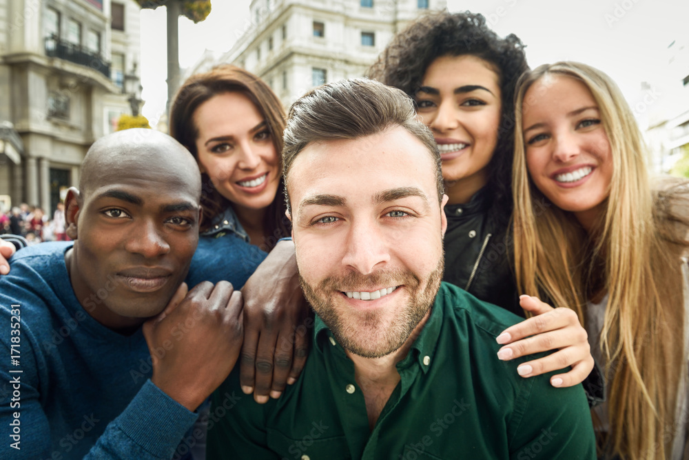 Multiracial group of young people taking selfie Stock Photo | Adobe Stock