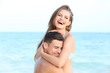 © Africa Studio - Happy young couple on sea beach
