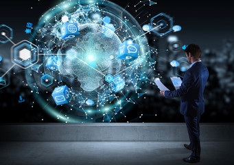 Poster - Businessman watching digital planet earth interface on a rooftop 3D rendering
