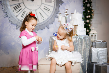 Wall Mural - Christmas Happy funny children twins sisters, Happy girls for the new year