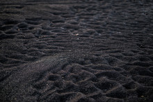 Volcanic Rock On Black Sand Beach At Vik In Southern Iceland