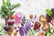 Variety Of Vegetables A Light Background. Beets, Red Cabbage, Beans, Tomatoes, Red Onions, Peppers Food Background. Vegetarian Food Concept