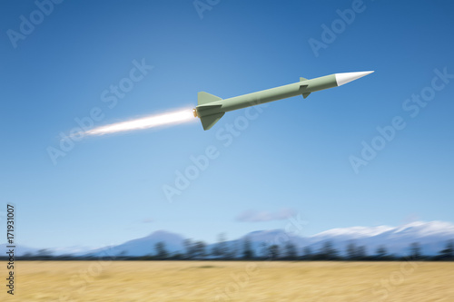 Zdjęcie XXL bomby jądrowej jądra latające nad polem krajobrazowym