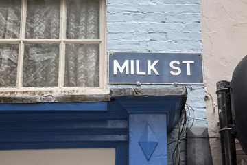 Wall Mural - Milk Street Sign on Stone Wall Facade, Shrewsbury