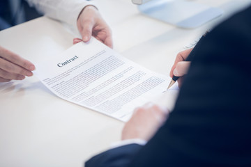 Wall Mural - Business man signing a contract