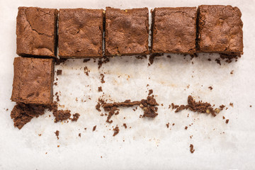 Wall Mural - homemade chocolate brownies on white background.
