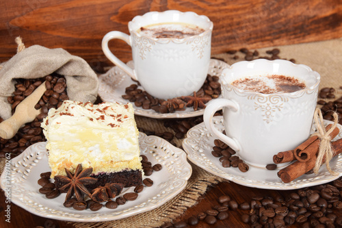 Two Retro Cups With Coffee And Foam With Milk Sprinkledcocoa And