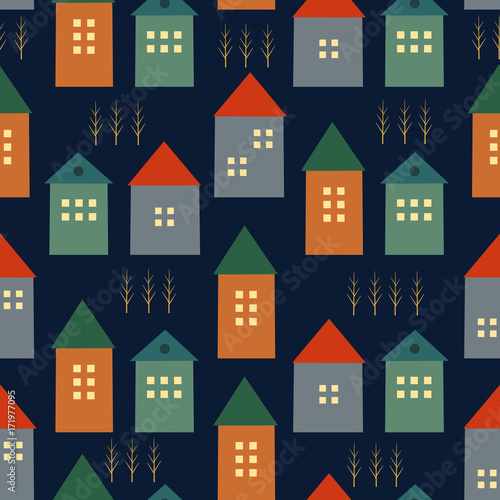 Cute houses and autumn trees seamless pattern on dark blue background. Scandinavian style illustration. Autumn landscape design for textile, wallpaper, fabric.