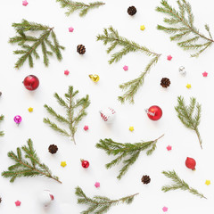 Wall Mural - Christmas tree branches and cones on white background, top view. New Year's background. Christmas background. 