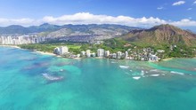 Drone Flies Up And Over The City Of Honolulu From Off The Coast