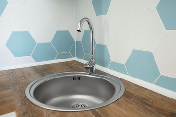 Wall Mural - Sink in light modern kitchen