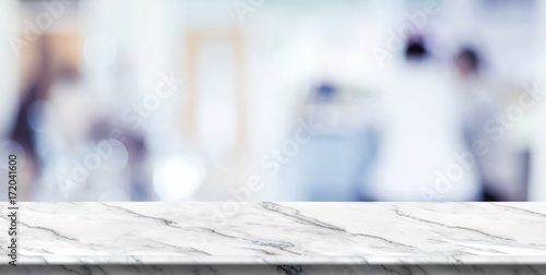 Empty White Marble Table Top With Blur Patient Waiting For Doctor