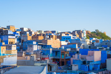 Jodhpur, Rajasthan, India, famous travel destination and tourist attraction. The blue city viewed from above in daylight, wide angle.