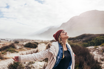 Wall Mural - Woman enjoying happy moments