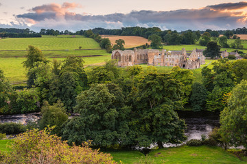 Sticker - River Tees flows past Egglestone Abbey / The remains of Egglestone Abbey on the banks of River Tees, near Barnard Castle in County Durham