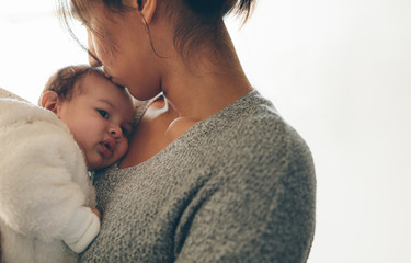 newborn baby boy in his mother's arms