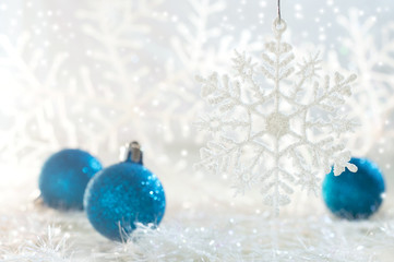 Wall Mural - Christmas balls. New Year's photo with a snowflake and Christmas balls.